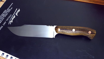 Daniel Poke made this one using Bocote and Copper for the handle