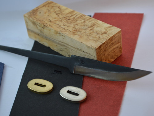 Polar 95 Carbon Steel blade, Curly Birch (Super grade) handle block, red or black fibre spacer (select one), matching bolster in brass or nickel silver (select one)