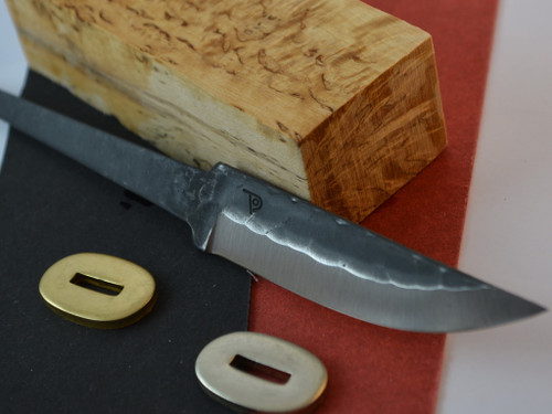 Polar 95 Carbon Steel blade in Hammered finish, Curly Birch (Super grade) handle block, red or black fibre spacer (select one), matching bolster in brass or nickel silver (select one)