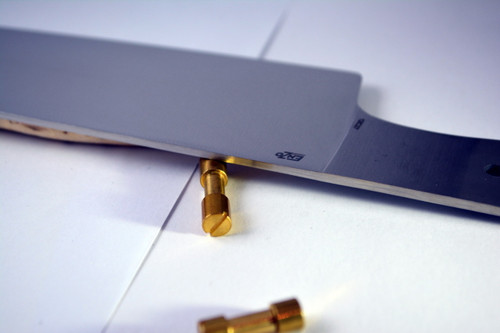 Detail of blade with optional corby bolts in brass