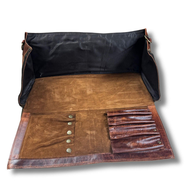 Interior of Nordic Edge blacksmith tool bag – buffalo leather with tool slots and compartments