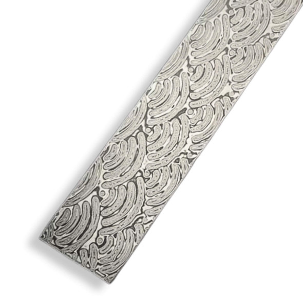 Close-up of stainless Damascus billet with waves pattern, 3 x 50 x 330mm, pre-hardened to 58 HRC