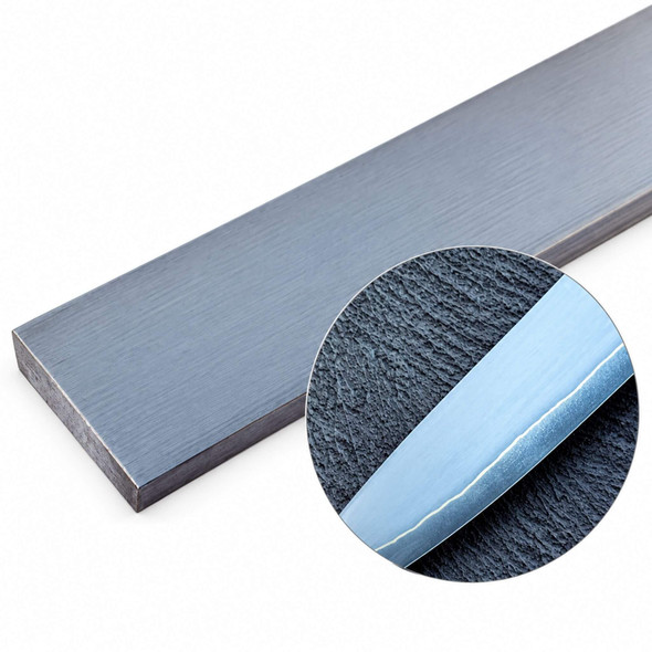 3-layer 5-ply stainless San Mai steel billet with finished knife blade showing laminate line