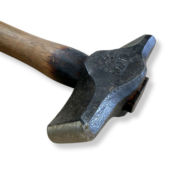 Close-up of Northern Iron Forge 2.5 lb Double Diagonal Hammer with forged steel head and timber handle