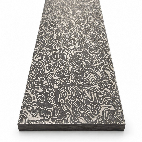 Close-up of Pebble pattern on pre-hardened stainless Damascus steel