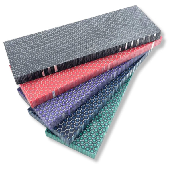 Honeycomb resin handle scales in multiple colours – black, red, purple, and green.