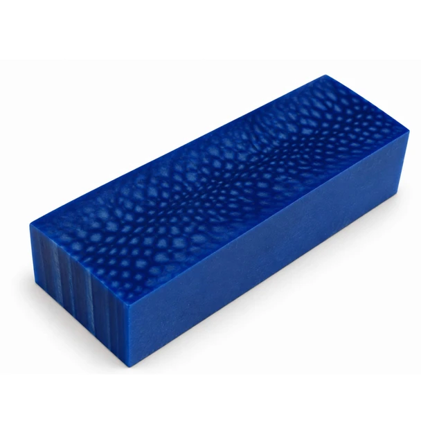Blue Dragon resin knife handle block, 120 x 40 x 30 mm, featuring deep blue tones and a distinctive 3D dragon-scale pattern on a white background.