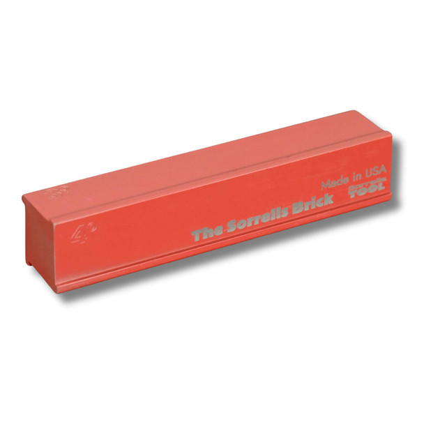 The Sorrells Brick knife grinding jig by Walter Sorrells – red tool showing logo and angles