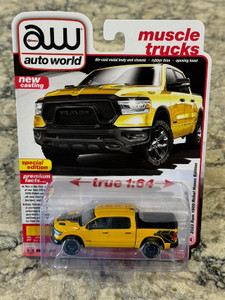 Auto World 2023 Ram 1500 Rebel Baja Yellow 1/64 Auto World 2023 Ram 1500 Rebel Baja Yellow 1/64