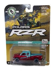 ULTRA RED CHASE Auto World Big Country Collectibles 2006 Chevy Silverado Polaris RZR 1/64