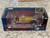 AUTO WORLD THE MUNSTERS GEORGE BARRIS DRAGULA 1:18 SCALE DIECAST Metallic Gold