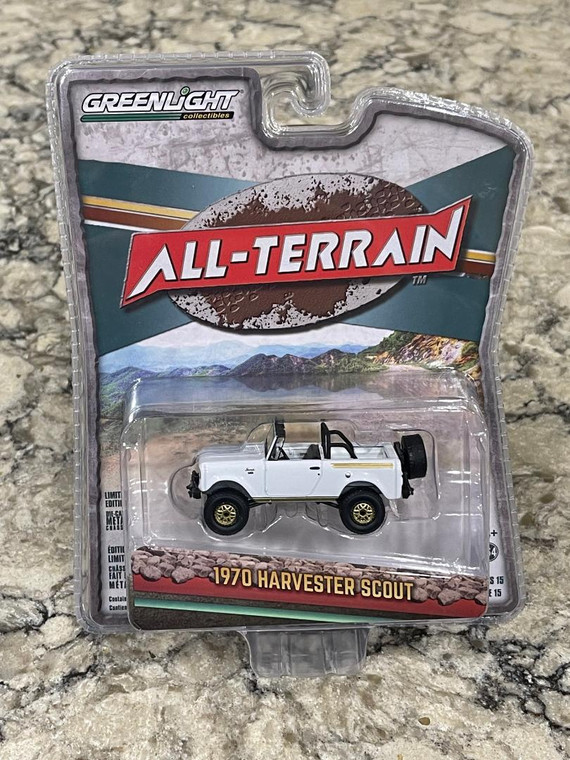 Greenlight 1970 Harvester Scout Lifted with Off-Road Parts White and Gold 1/64