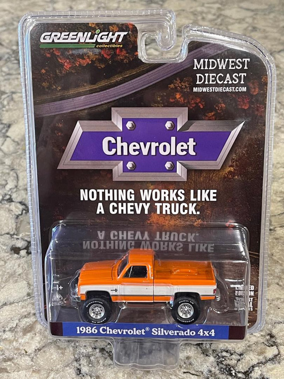 Mini Case of 12 Greenlight 1986 Chevrolet Silverado 4 x 4 Orange & White 1/64