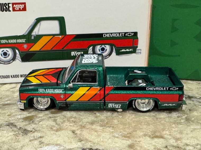 Sealed Case of 24 Kaido House x Mini GT 1:64 Chevrolet Silverado KAIDO WORKS V3 -Dark Green 1/64