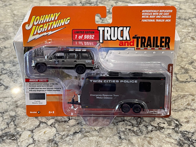 Johnny Lightning Gray Twin Cities Police 1997 Chevy Tahoe with Camper Trailer 1/64