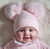 pink baby hat with 2 pom poms