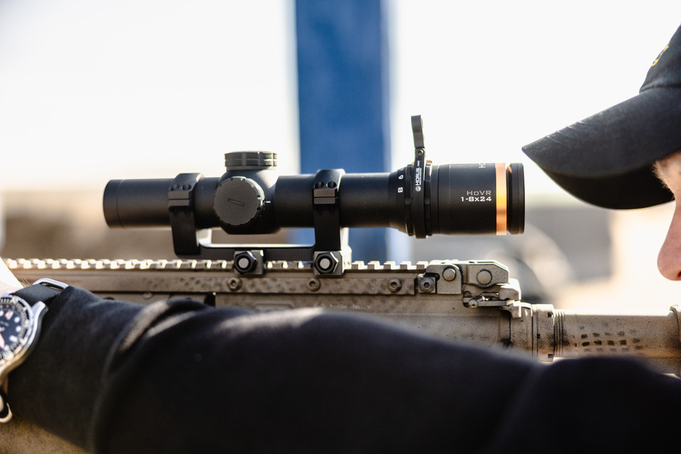 Precision rifle with Horus optic in field terrain