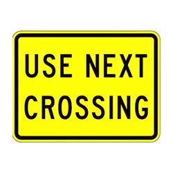 W10-14a Use Next Crossing Plaque