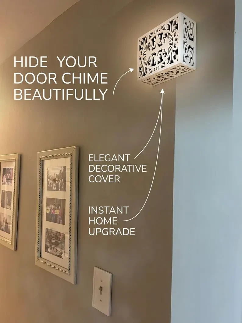 Unique decorative doorbell cover box on wall