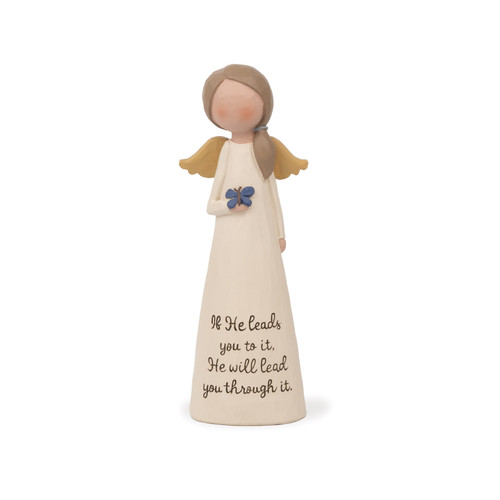 A cream-colored Blossom Bucket resin angel figurine with golden wings and a blue butterfly, featuring the inscribed text "If He leads you to it, He will lead you through it."