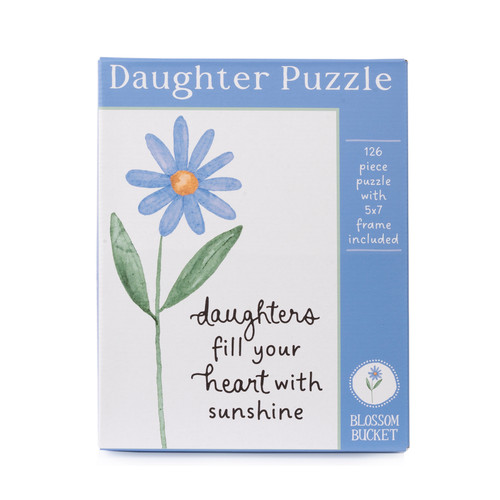 A boxed Blossom Bucket Daughter Puzzle set featuring a blue watercolor daisy and the text "daughters fill your heart with sunshine," noting 126 pieces and an included 5x7 frame.