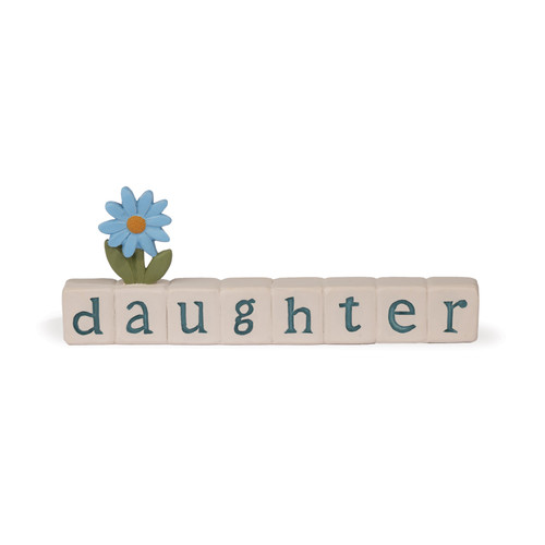 A hand-painted resin decorative block from Blossom Bucket spelling 'daughter' in teal letters on cream tiles, topped with a single blue flower and green leaves.