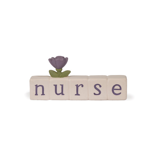 A hand-painted resin decorative block from Blossom Bucket spelling 'nurse' in purple letters on cream tiles, topped with a single purple tulip and green leaves.