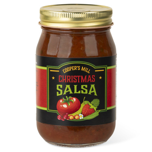 A 16-ounce glass jar of Cooper's Mill Christmas Salsa with gold screw-on lid. Black and red label shows illustrations of a tomato, jalapeno peppers, a strawberry, and cranberries.