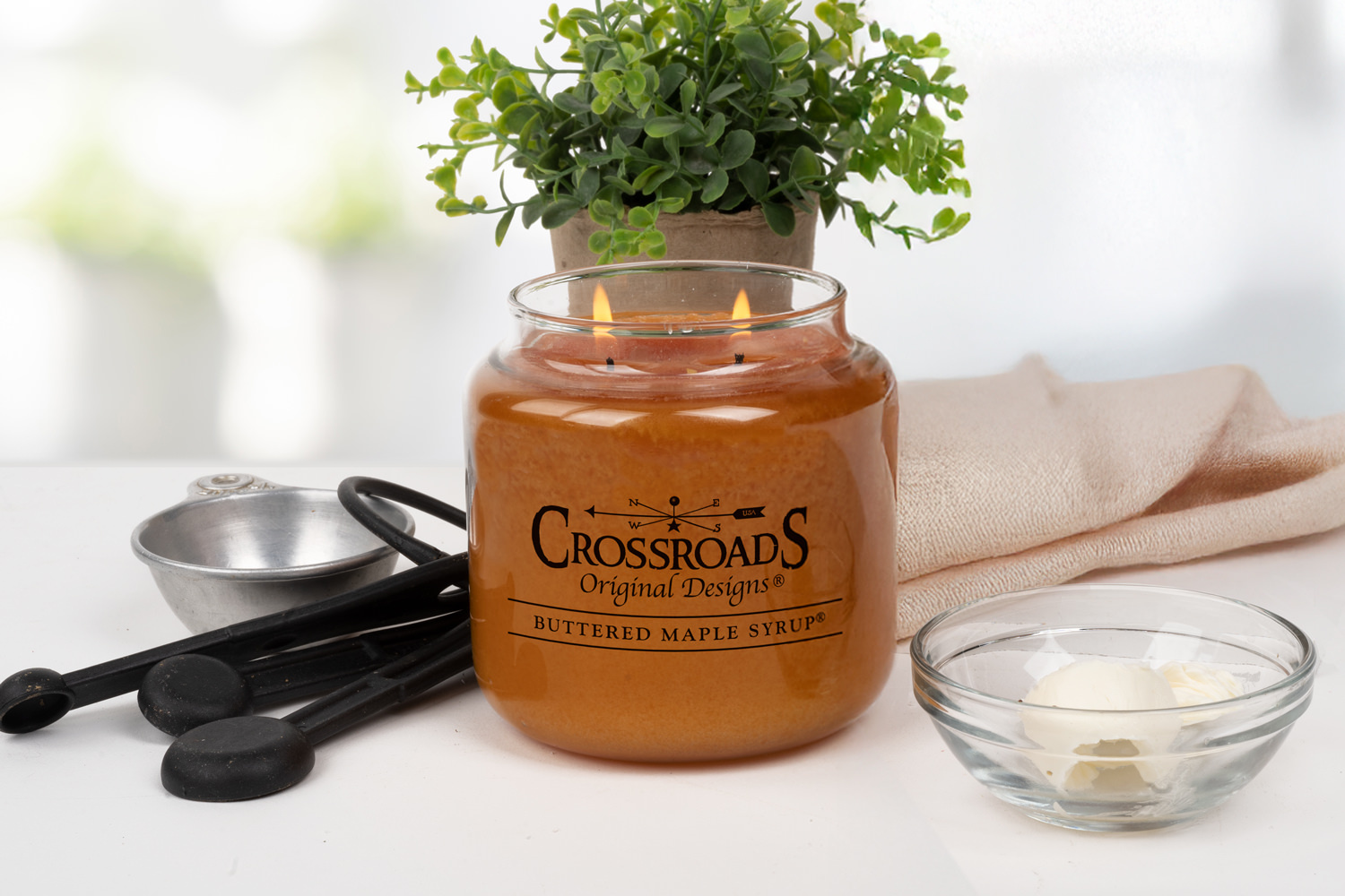 Free 16 oz. Buttered Maple Syrup scented jar candle with any $60* retail web order through 3/5/26.