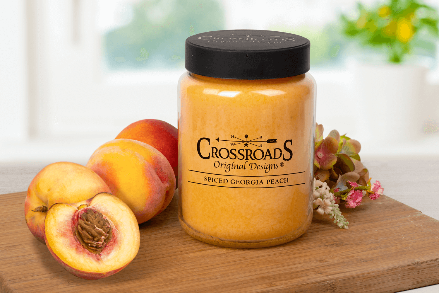 Sweet and juicy Spiced Georgia Peach scented jar candle featuring a clean-burning wicks and premium wax for a long-lasting home fragrance.
