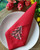 Green Christmas Tree in Red Table Napkin