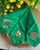 Felicidad in Green Table Napkin