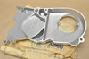 NOS Honda C100 C105 CZ100 Engine Stator Chain Sprocket Side Cover 11341-001-010