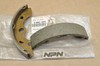 NOS Kawasaki 1986-87 KLF300 Bayou Front Brake Shoe Set 41048-1089