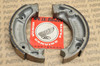 NOS Honda 1982-83 NU50 Urban Express Brake Shoe Pad Pair 45120-GG2-003