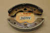 NOS Honda 1984 TRX200 Front Brake Shoe Pad Set for 1 Hub 45151-VM0-003
