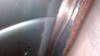 Inside floor edge of fuel tank