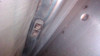lower back inside edge of tank