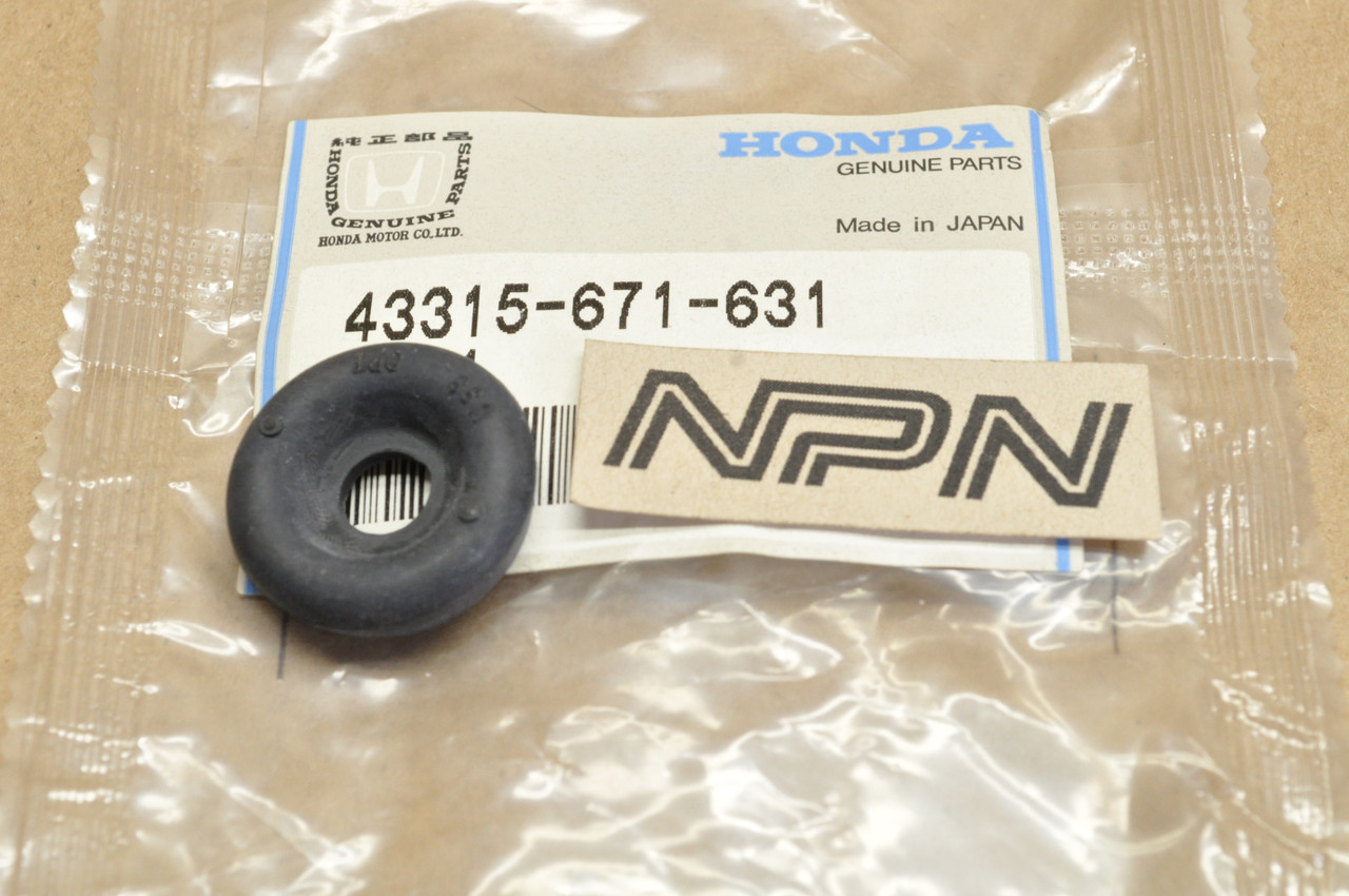 NOS Honda TRX300 FW Fourtrax Front Brake Cylinder Dust Cover 43315-671-631