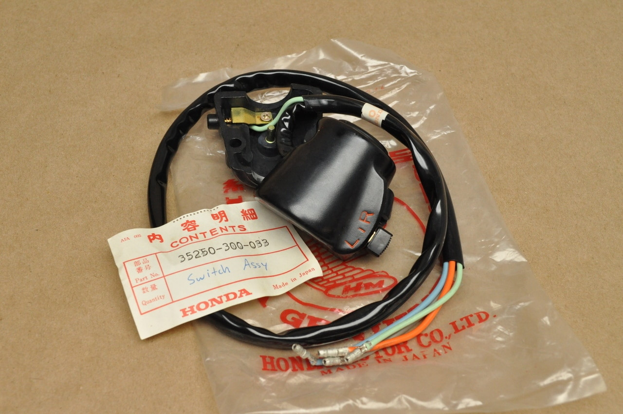NOS Honda CB750 Sandcast Left Turn Signal & Horn Switch 35250-300-033