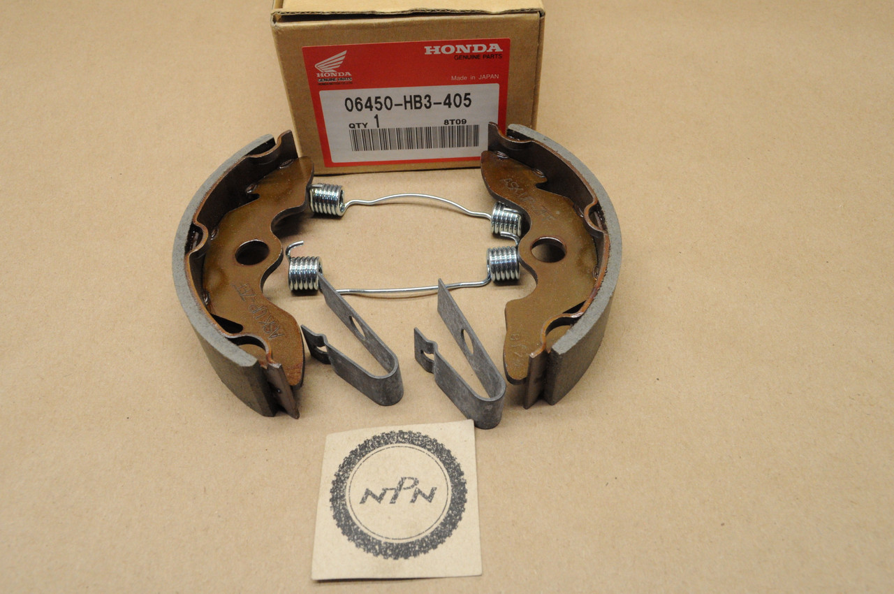 NOS Honda 1988 TRX300 FOURTRAX Front Brake Shoe Set 06450-HB3-405