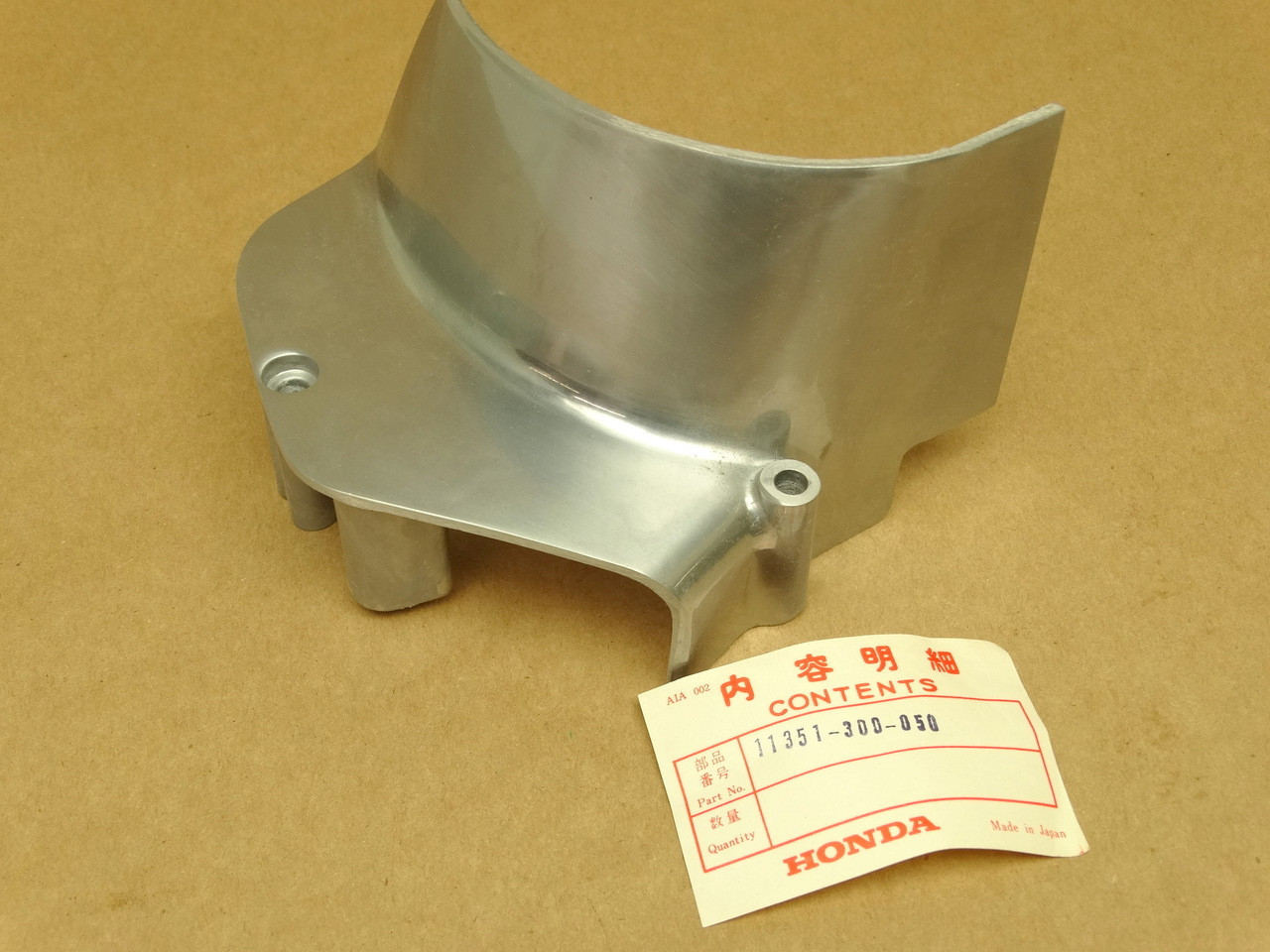 NOS Honda CB750 K0-K2 Left Rear Crankcase Chain Sprocket Cover