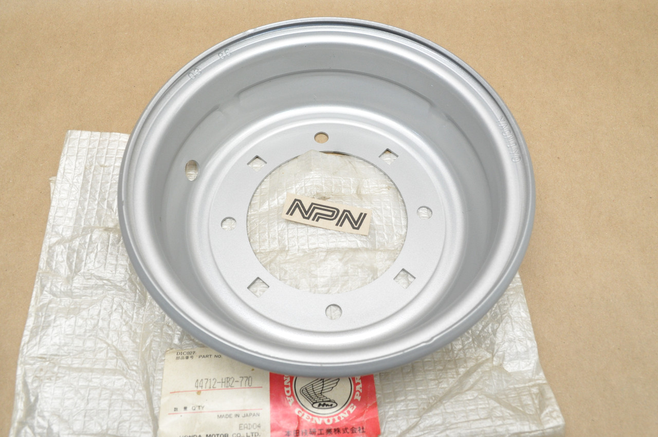 NOS Honda 1986-87 TRX70 Fourtrax Silver Front Wheel Outer Rim 44712-HB2-770