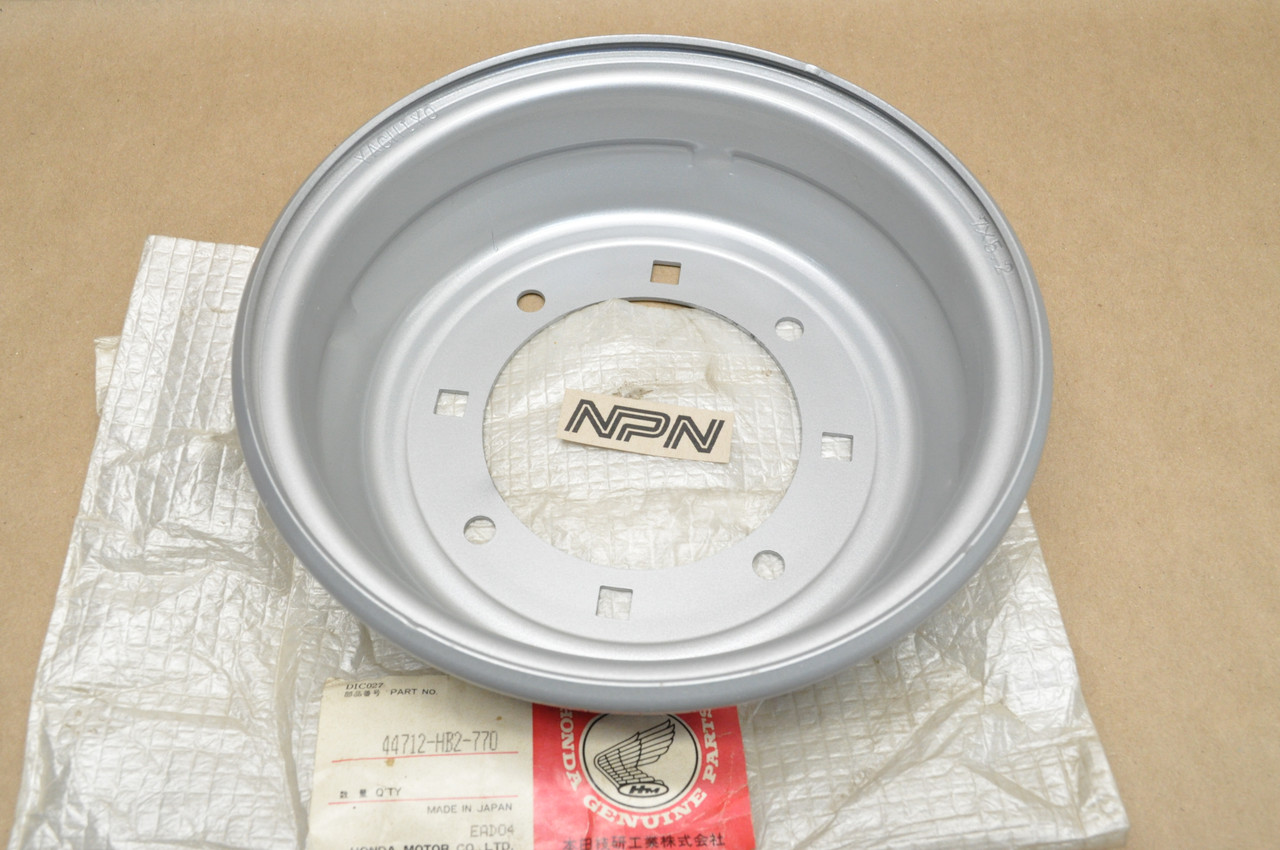 NOS Honda 1986-87 TRX70 Fourtrax Silver Front Wheel Outer Rim 44712-HB2-770