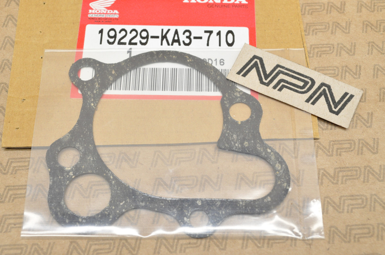 NOS Honda 1983 CR125 R Water Pump Cover Gasket 19229-KA3-710