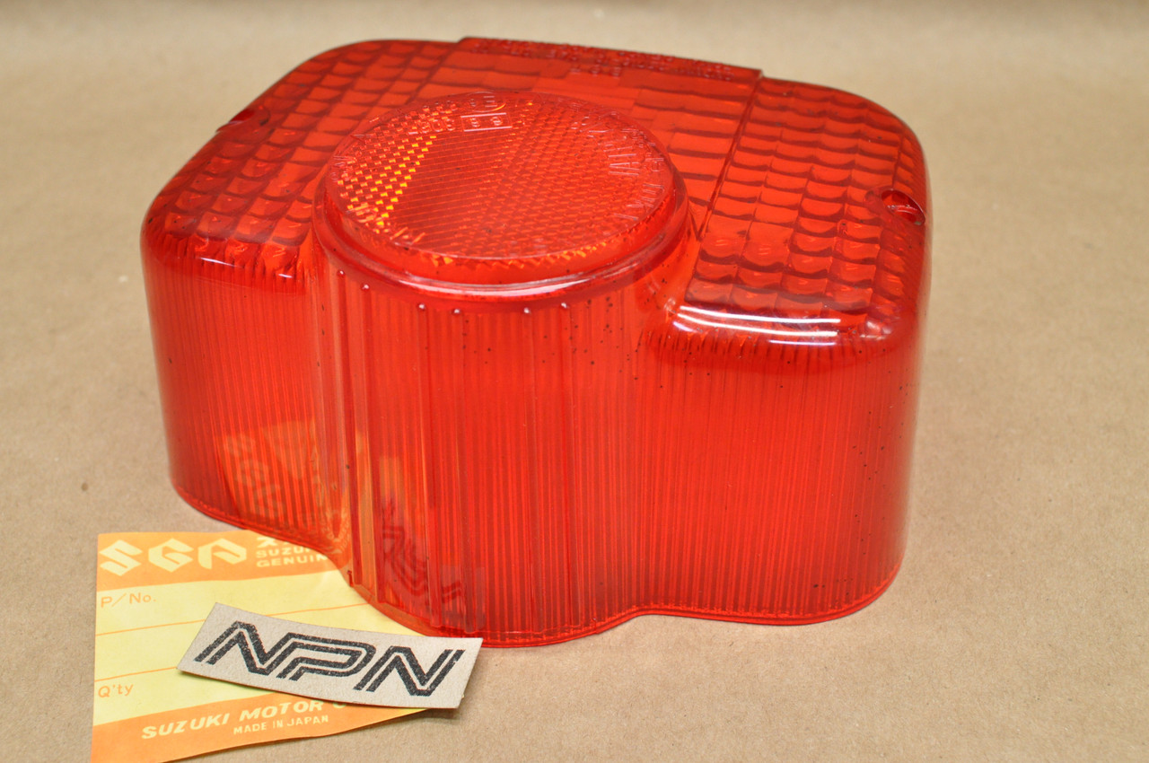 NOS Suzuki MT50 TC125 TC185 TS100 TS250 TS400 TS50 TS75 Tail Light Lens 35712-27630