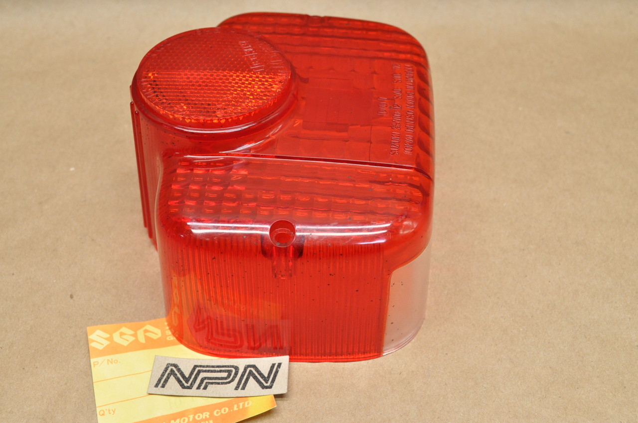 NOS Suzuki MT50 TC125 TC185 TS100 TS250 TS400 TS50 TS75 Tail Light Lens 35712-27630