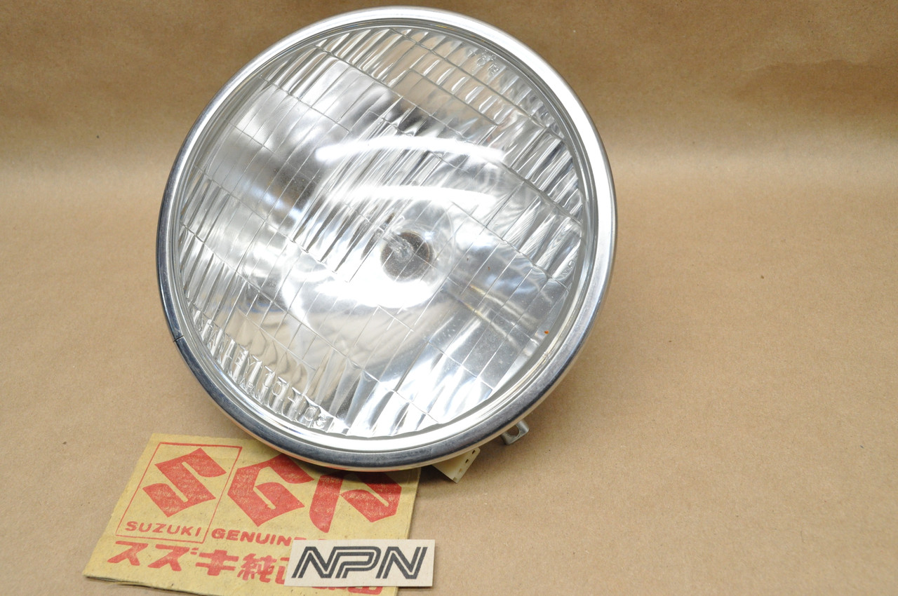 NOS Suzuki 1973-77 GT250 1976-77 GT500 Stanley Head Light Lens 12V 35121-18620