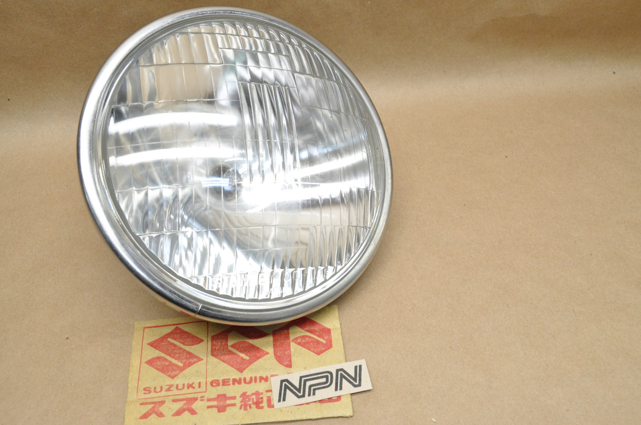 NOS Suzuki 1973-77 GT250 1976-77 GT500 Stanley Head Light Lens 12V 35121-18620