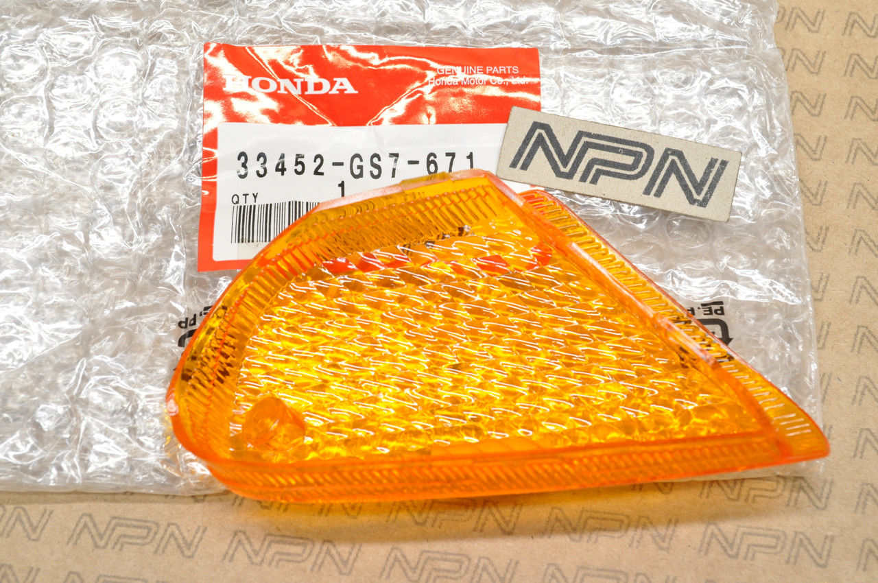 NOS Honda SA50 SB50 Elite Left Front Turn Signal Lens Cover 33452-GS7-671